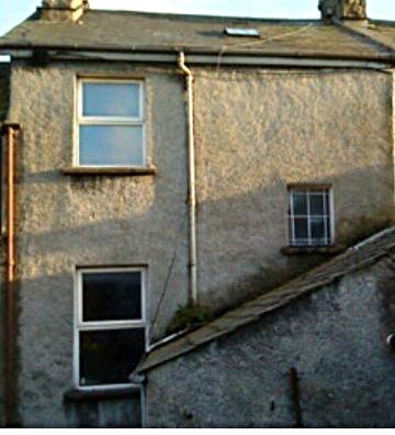 Before Picture of House with damp penetration, repaired by Chris Daly Plaatering
